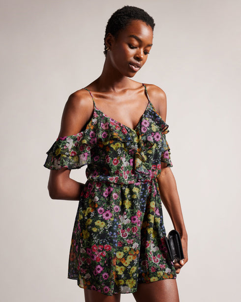PRIYAHH-Trousers-Need an outfit to match your sunny disposition? Look no further than PRIYAHH. With ruffled off-shoulder sleeves and a flattering V-neck, this romper is perfect for any occasion from weekend brunch to a beach day. Plus, adjustable straps ensure a comfortable fit.The fabric of this product is made with 55% recycled polyester. Using recycled polyester helps divert plastic waste from ending in landfills, and helps us to reduce our dependence on virgin materials. Romper Off shoulder sleeves with